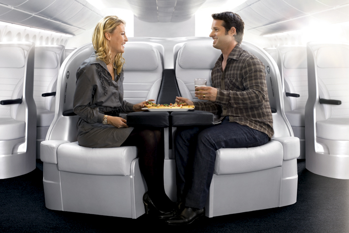 premium-economy-couple-dining-together