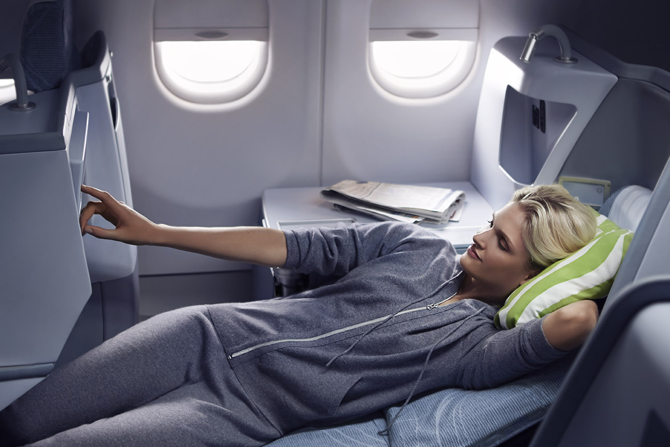 Finnair business woman resting 01 Low