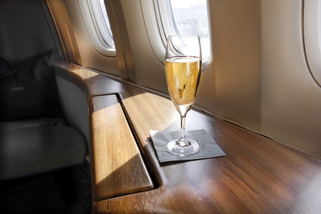 Glass of champagne on a flight