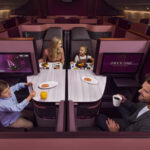 Family in Qatar Airways' Qsuite Quad