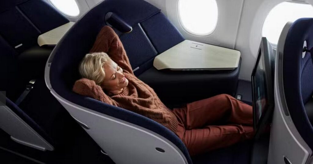 Lady relaxing in business seat